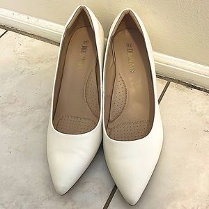 Brand new, never worn, white wedge pump shoe. Size 11 Brand DREAM PAIRS.